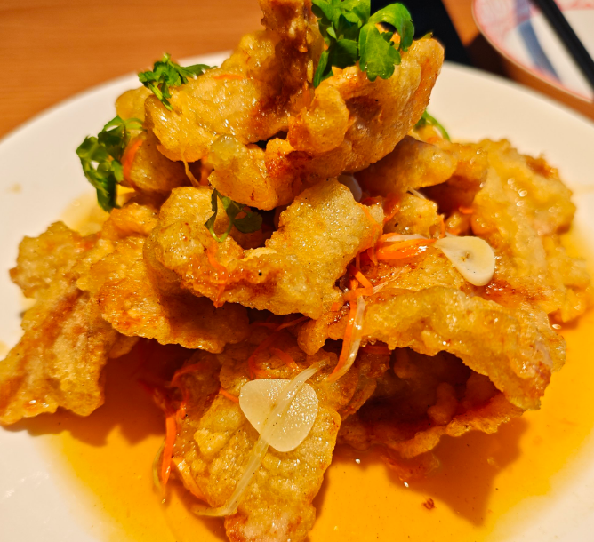 冰城美食名片锅包肉：从百年传承到四季飘香